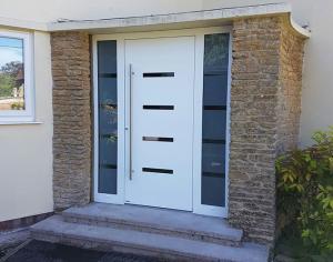 white modern part glazed front door