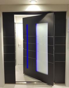 RK Pivor door with blue led lighting