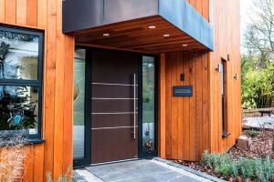Timber effect pivot front door