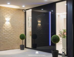 Glass faced pivot door with LED lights recessed handle