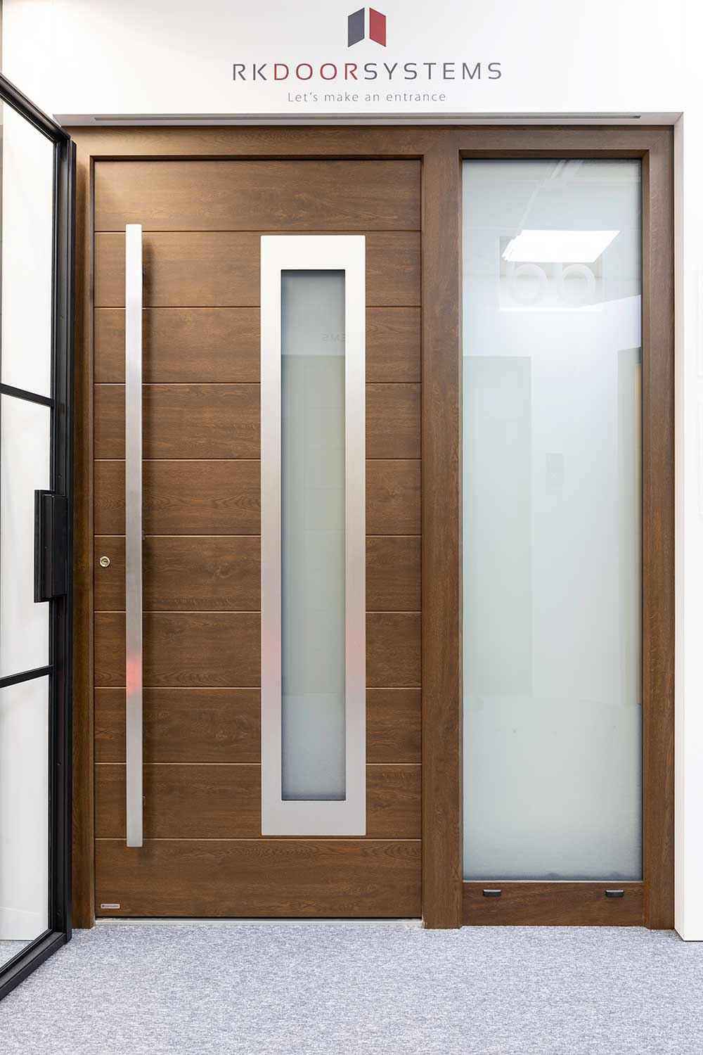 Hertford showroom timber effect door with sidelight