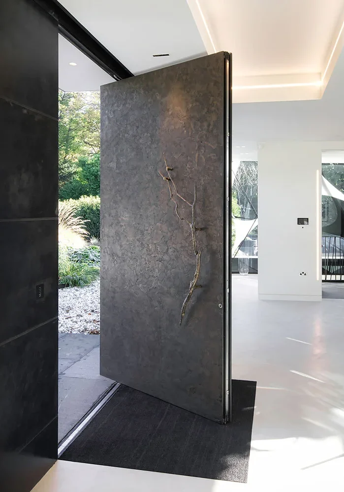 Blackened Pivot door