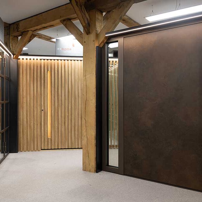 surrey showrrom 38907 Aluminium ceramic door and timber clad door in the Woking Surrey showroom